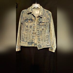 Ladies distressed denim jacket in good condition.